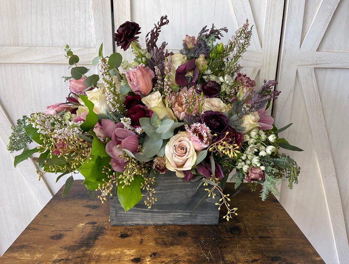 How much will a flower arrangement cost?