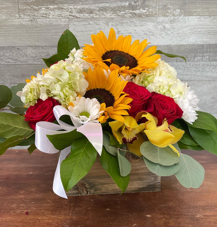 What type of flowers or flower arrangement is good for a teacher gift?