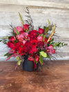 Ruby Embrace red rose and orchid flower arrangement in a black hat box by Lia’s Flowers - Pic 1