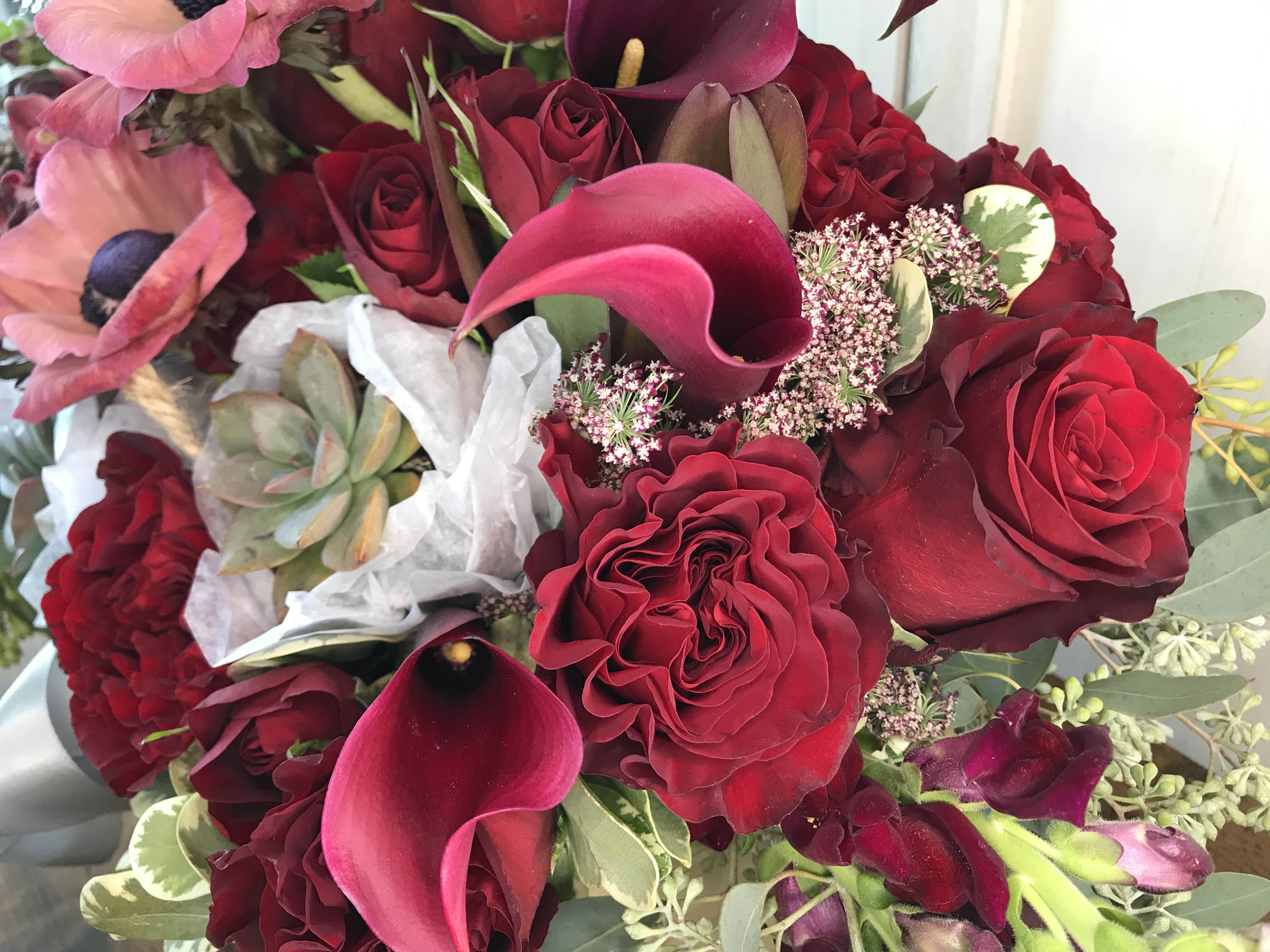 burgundy succulent bouquet Succulent Arrangement